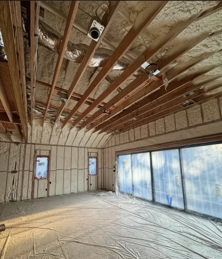 Interior walls and ceiling insulated with spray foam during new construction in Wappingers Falls